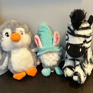 3 very cute stuffed animals (gnome, penguin and zebra)